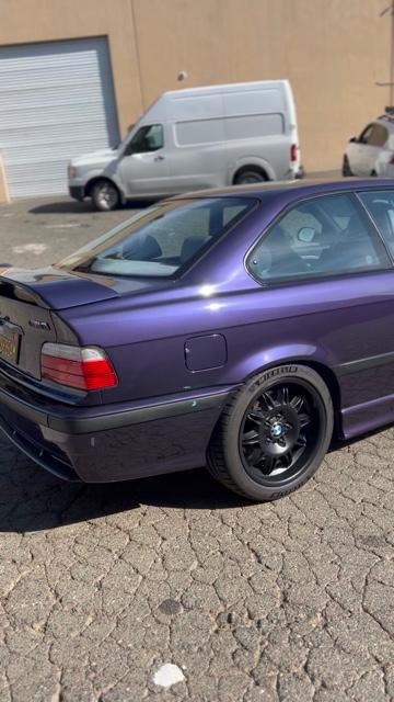 Purple BMW coupe after detail